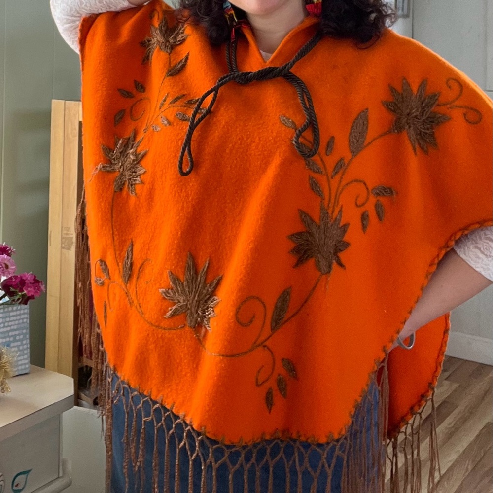 Vintage 1970s alert! Gorgeous handmade orange cape.